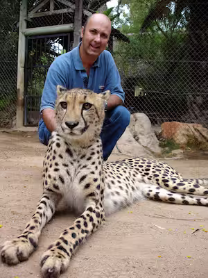 Bruce Josephs and cheetah in South Africa